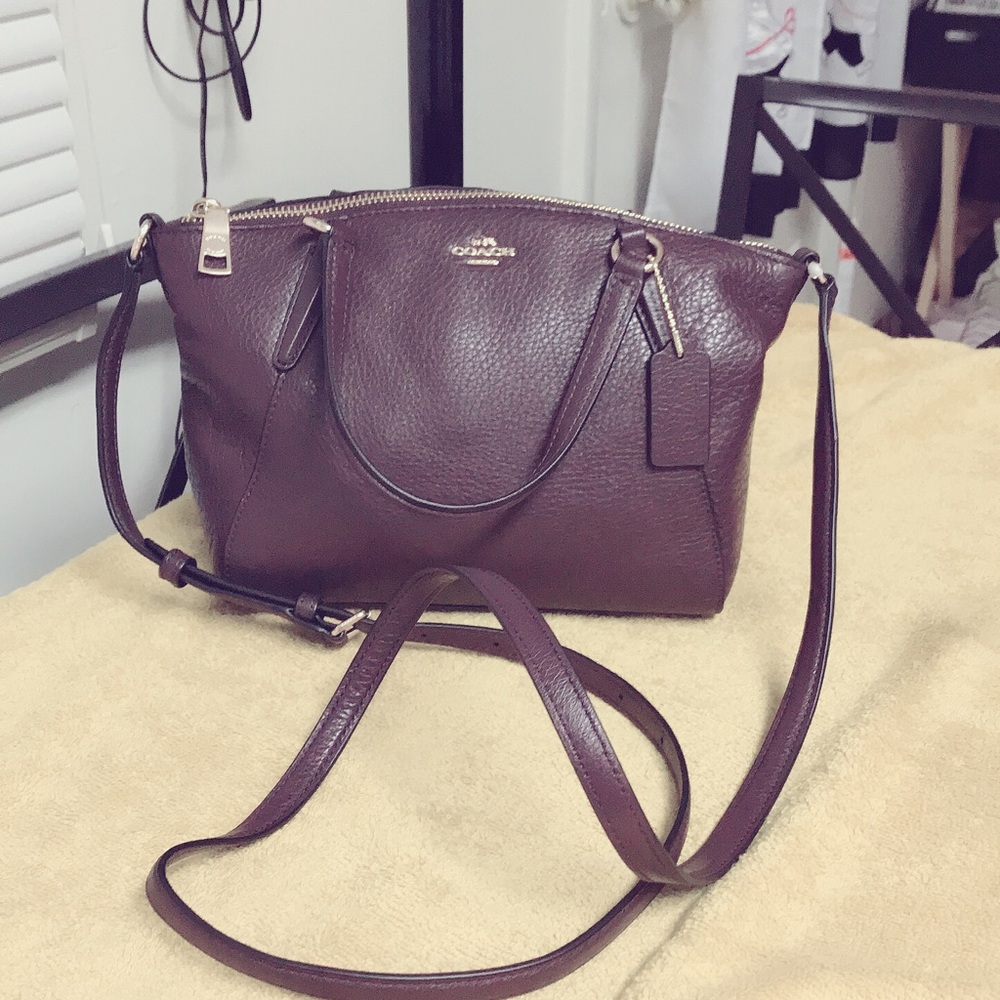 Sold!! Coach sling bag small or two way to use